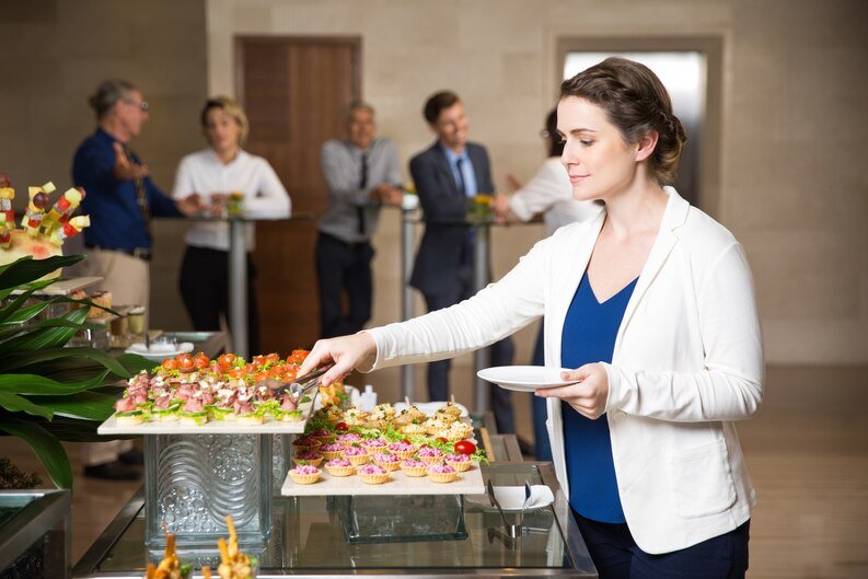 20230811191023_[fpdl.in]_businesswoman-serving-herself-buffet-restaurant_1262-1714_medium